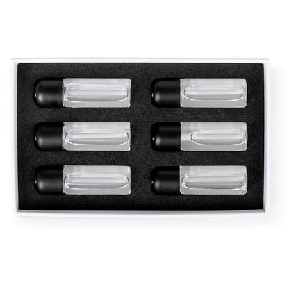 Set of six clear cylindrical containers with black lids in a black box on a white background