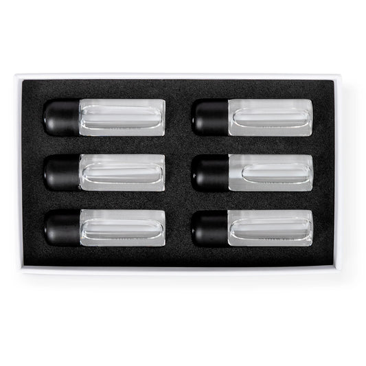 Set of six clear cylindrical containers with black lids in a black box on a white background